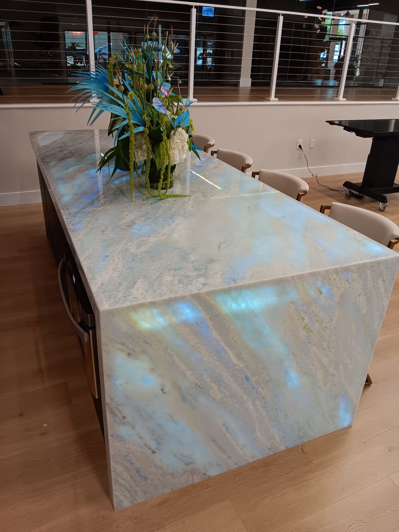 Exotic blue marble kitchen island with waterfall edge